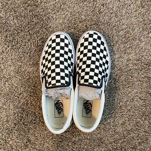 Vans Black and White Checkered Slip-Ons